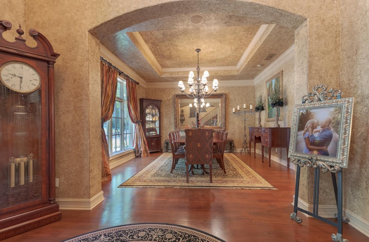 Luxury Country French dining room designed by Bort Design with decorative finishes and natural light in Longview, TX.-optimized