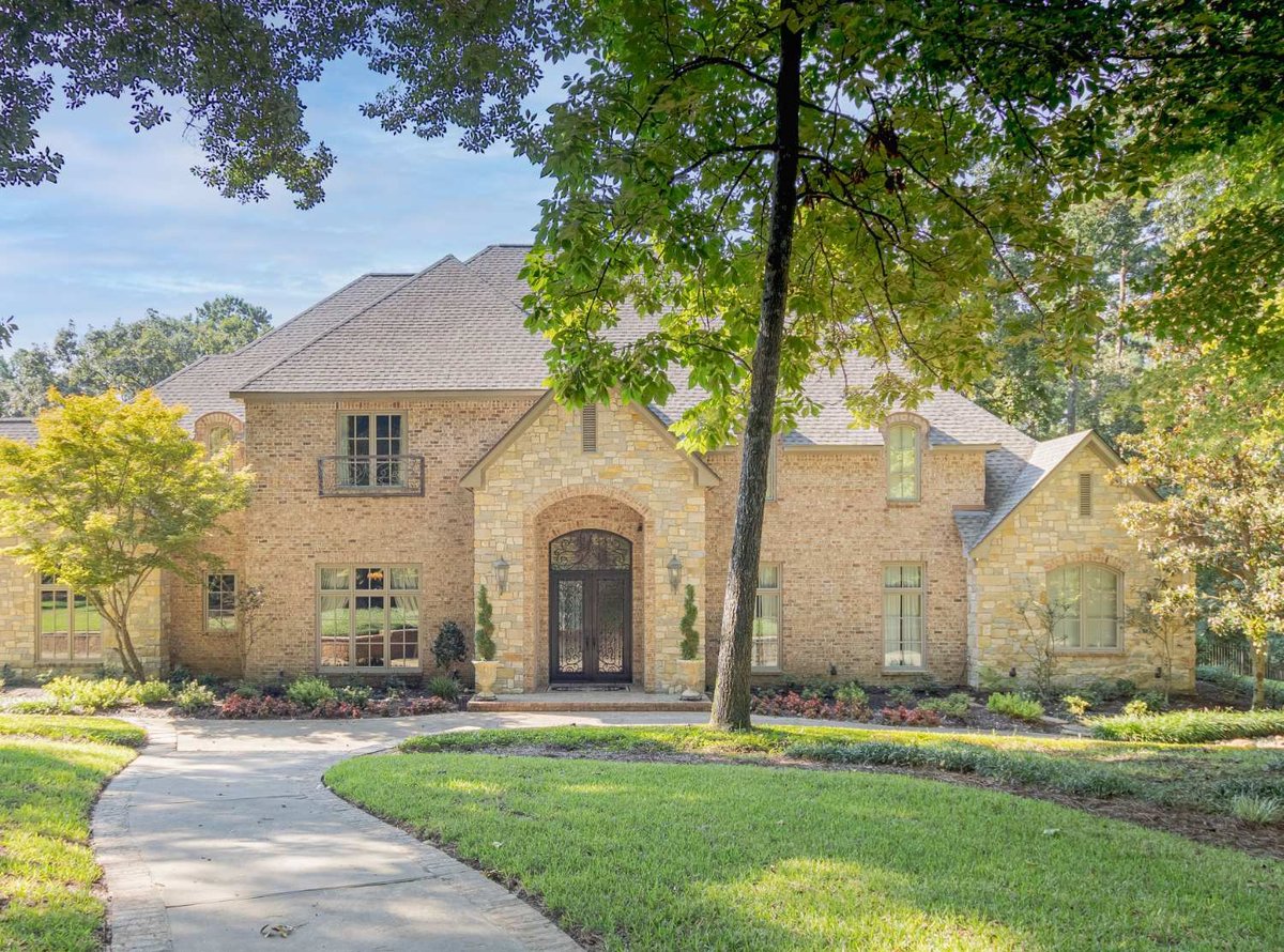Stately Country French custom home exterior by Bort Design with brick and stone architecture in Longview, TX.-optimized