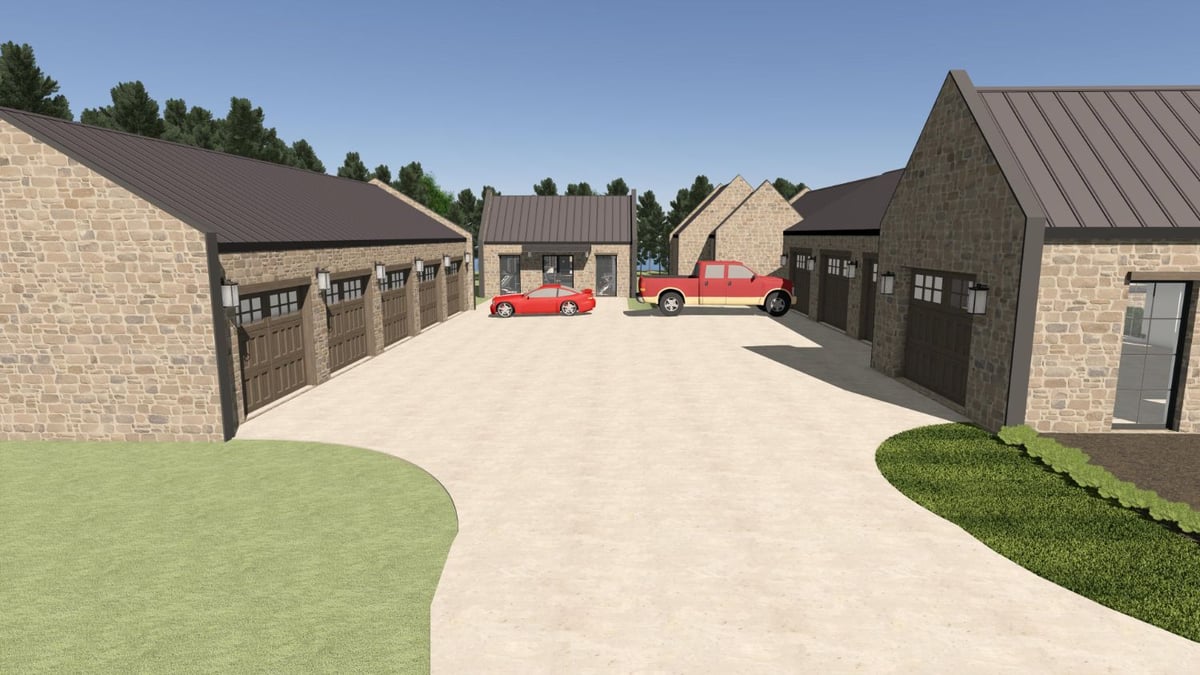 Luxury custom home garage courtyard with stone architecture and extensive vehicle storage by Bort Design in Longview, TX.-optimized