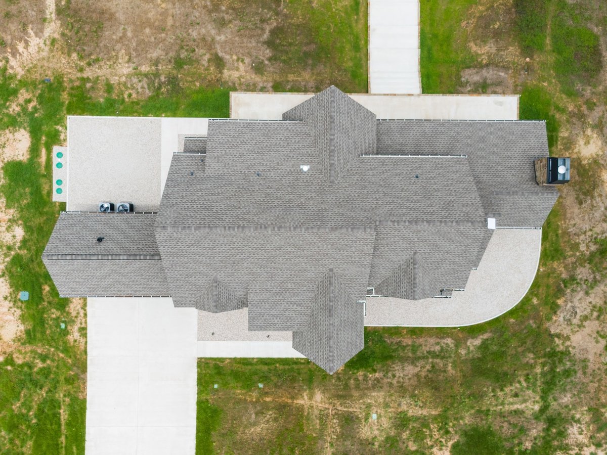 overhead aerial view of custom home roof and driveway in longview texas custom home