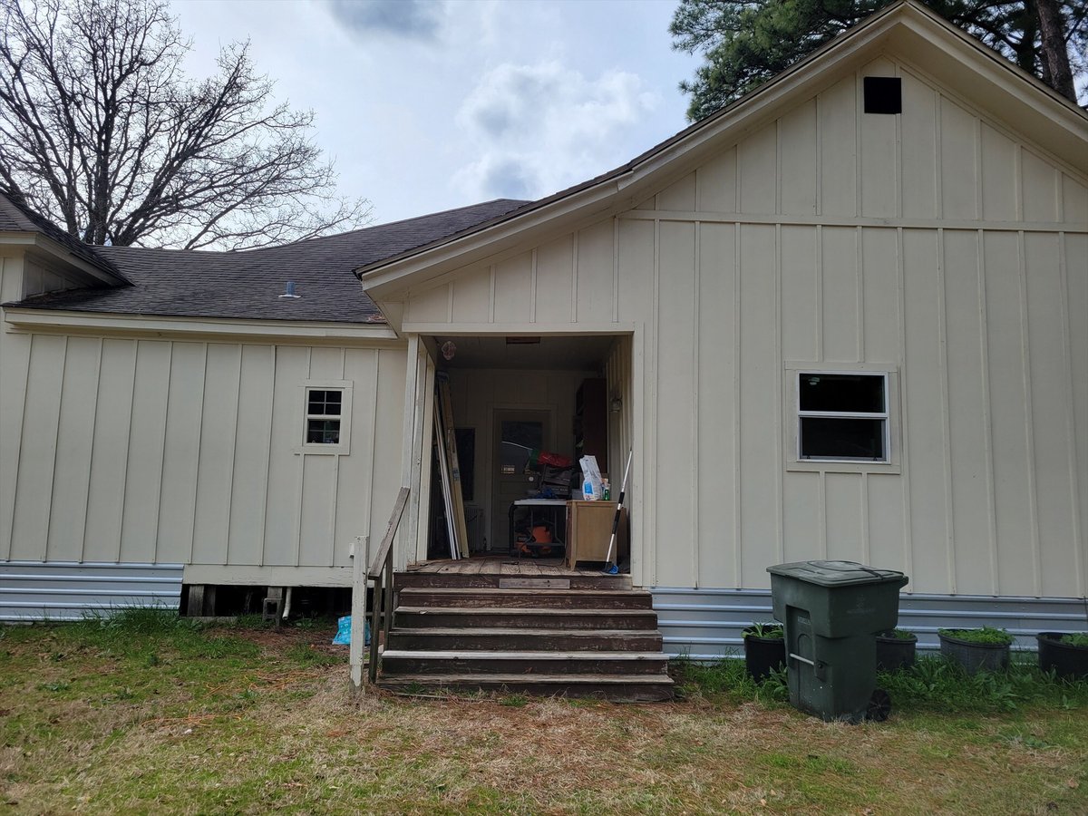 before east texas home remodel back entry wooden steps cream siding bort custom homes