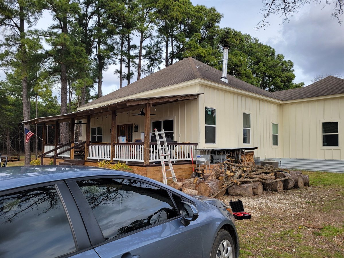 before east texas home remodel exterior cream board and batten front porch bort custom homes