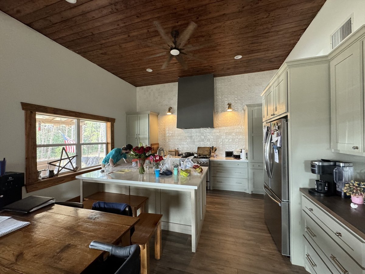 before east texas home remodel kitchen sage cabinets white island range hood bort custom homes